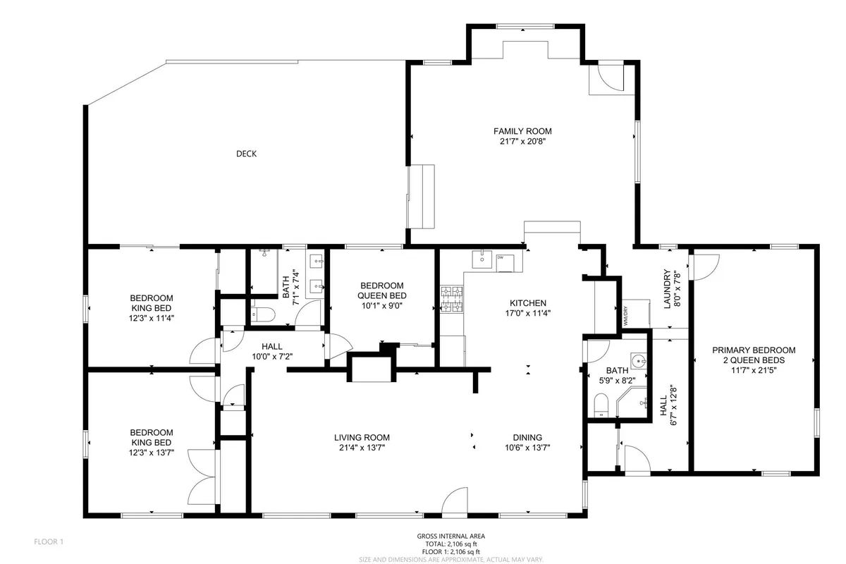 This image captures an open concept family room with visible kitchen and primary bedroom, and a direct view out onto a deck. The space feels welcoming and versatile, with areas for relaxing, entertaining, and connecting indoors to outdoors. The natural light and inviting atmosphere reflect an environment ideal for both downtime and social gatherings.